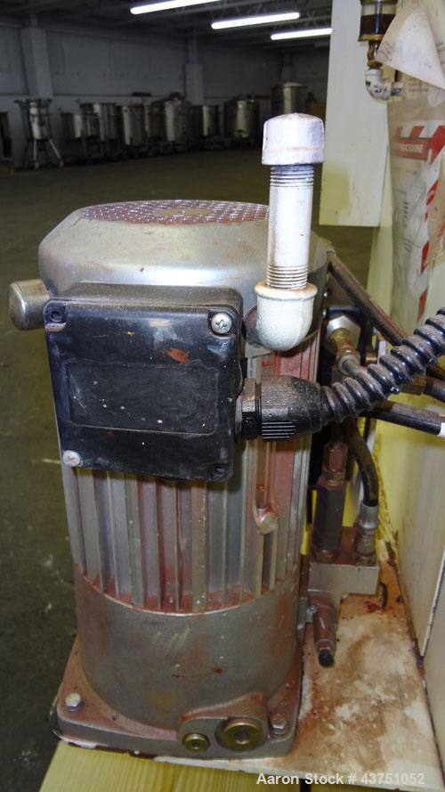 Used Lehmann Horizontal Three Roll Mill, Model 663-V. (3) 9" Diameter x 24" wide Bi-Metal cast iron adjustable cored rolls. Adjustable brass edge guides, knife scraper with discharge pan, bottom drip...