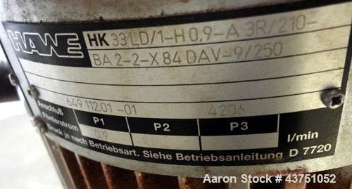 Used Lehmann Horizontal Three Roll Mill, Model 663-V. (3) 9" Diameter x 24" wide Bi-Metal cast iron adjustable cored rolls. Adjustable brass edge guides, knife scraper with discharge pan, bottom drip...