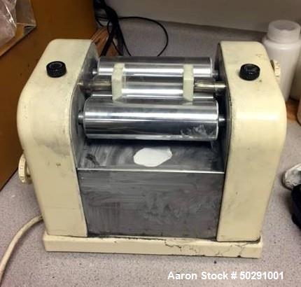 Used Lab 3 Roll Mill. Approximate 2" diameter x 6" long chrome rolls.