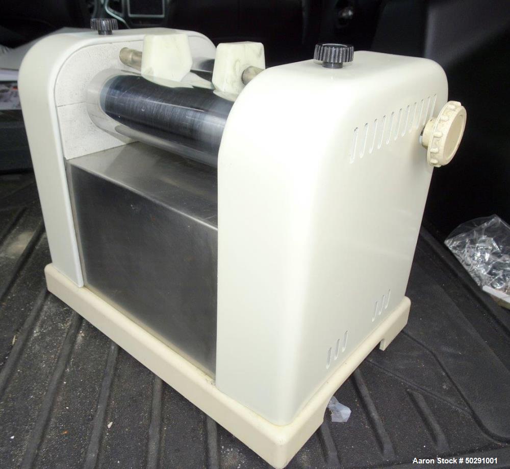 Used Lab 3 Roll Mill. Approximate 2" diameter x 6" long chrome rolls.
