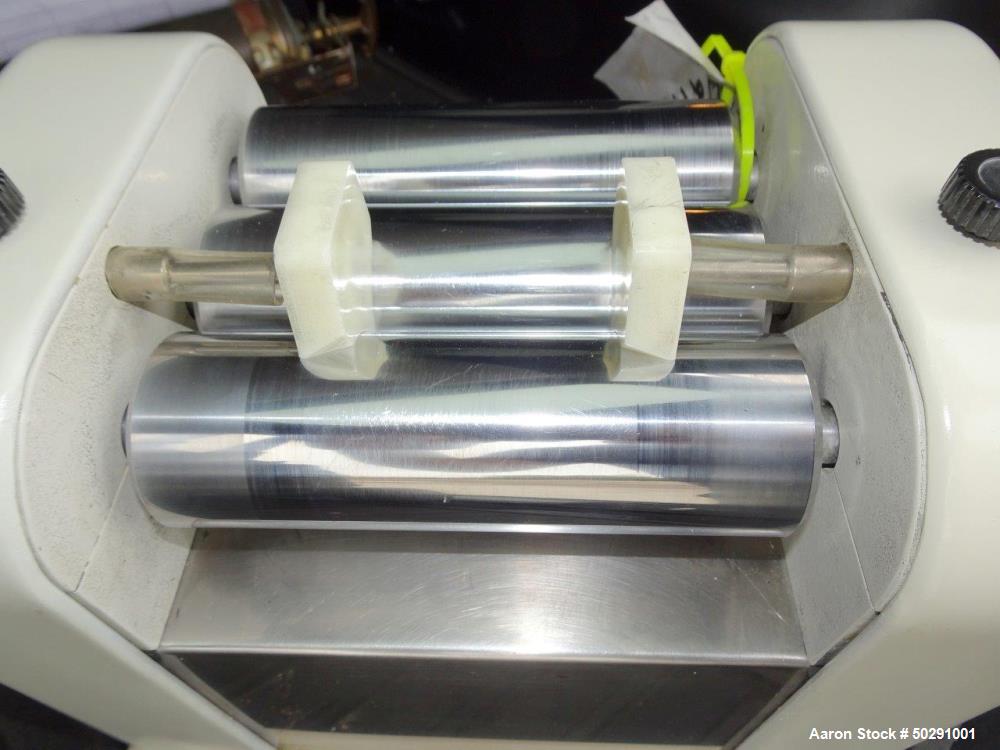 Used Lab 3 Roll Mill. Approximate 2" diameter x 6" long chrome rolls.