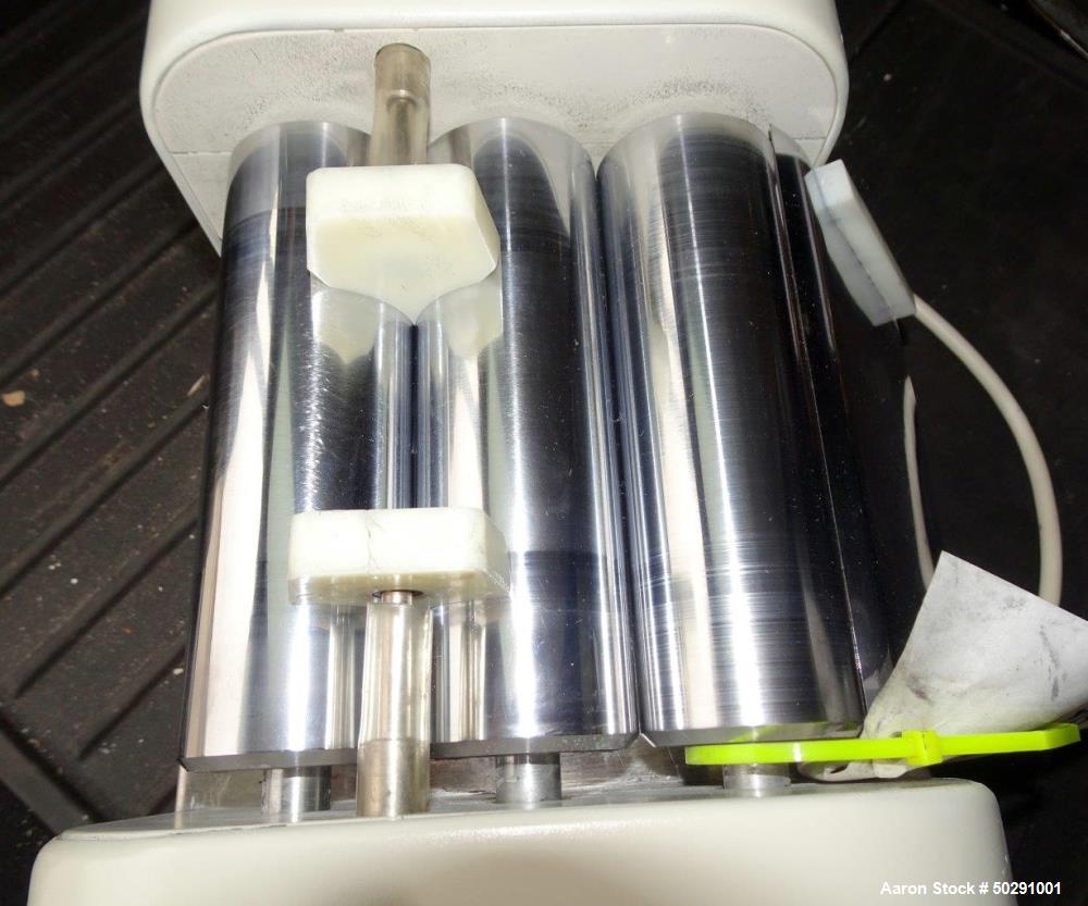 Used Lab 3 Roll Mill. Approximate 2" diameter x 6" long chrome rolls.