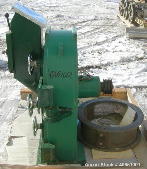 Used Bauermeister Universal Mill, Model UT23, Carbon Steel. Approximately 18" diameter x 6" deep sieve ring assembly with 3 grinding jaw, and 3 sieve plates. Approximately 17 1/2" diameter revolving ...