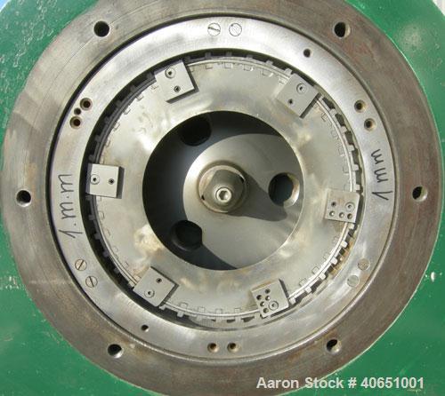 Used Bauermeister Universal Mill, Model UT23, Carbon Steel. Approximately 18" diameter x 6" deep sieve ring assembly with 3 grinding jaw, and 3 sieve plates. Approximately 17 1/2" diameter revolving ...
