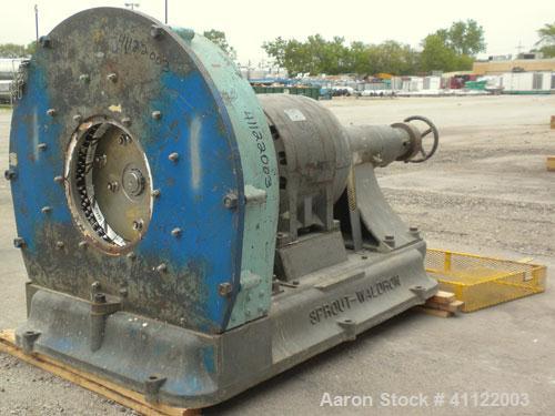 Used Sprout-Waldron Single Runner Attrition Mill, Type 36. Carbon Steel Housing with 446 stainless steel removable grinding plates. 19’’ Diameter front feed opening with (2) 42’’ wide roller feed, dr...