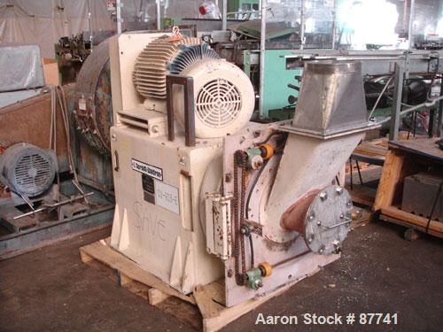 Used Sprout Waldron/Kopper Single Disc Mill, Model DM-24. Stainless steel contact surfaces, 24" diameter disc, hand wheel plate gap adjustment, gravity feed, swing away front cover, belt driven with ...