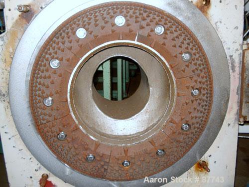 Used Sprout Waldron/Kopper Single Disc Mill, Model DM-24. Stainless steel contact surfaces, 24" diameter disc, hand wheel plate gap adjustment, gravity feed, swing away front cover, belt driven with ...