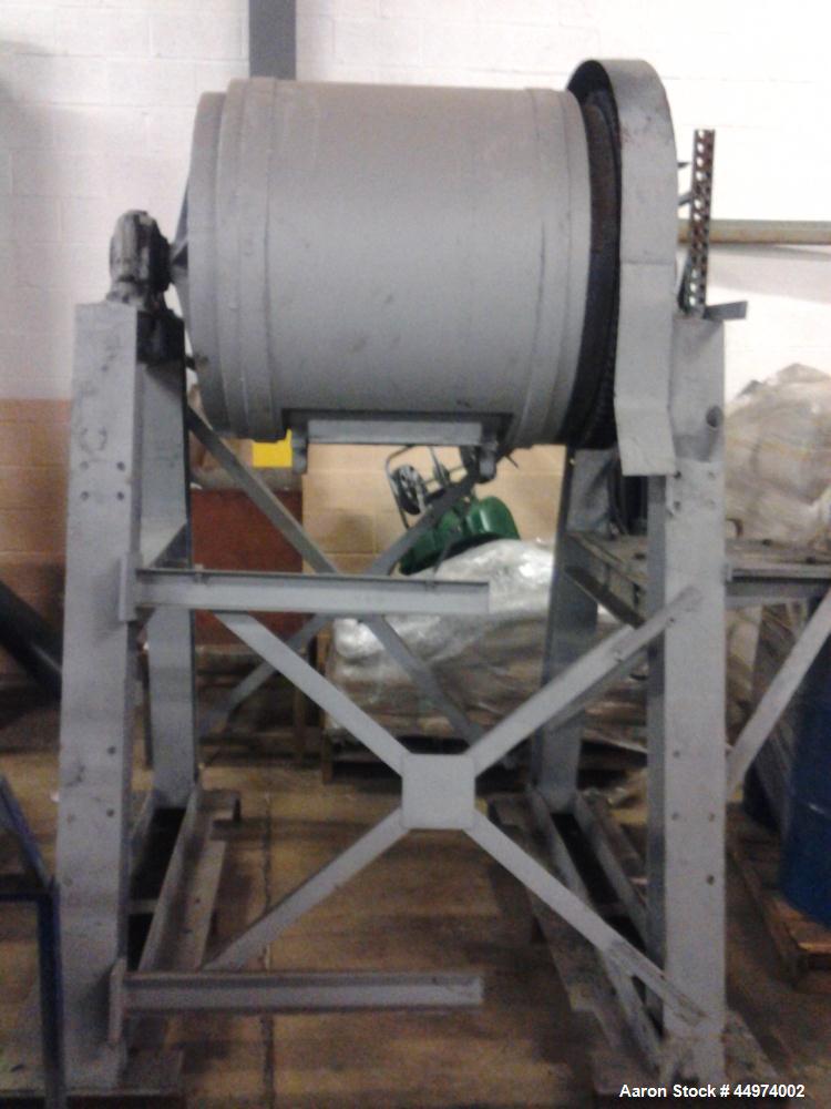 Used Ball Mill, 24 cubic foot capacity, rubber lined drum.  Includes complete mill motor, drive unit, control panels, electrical connection boxes.
