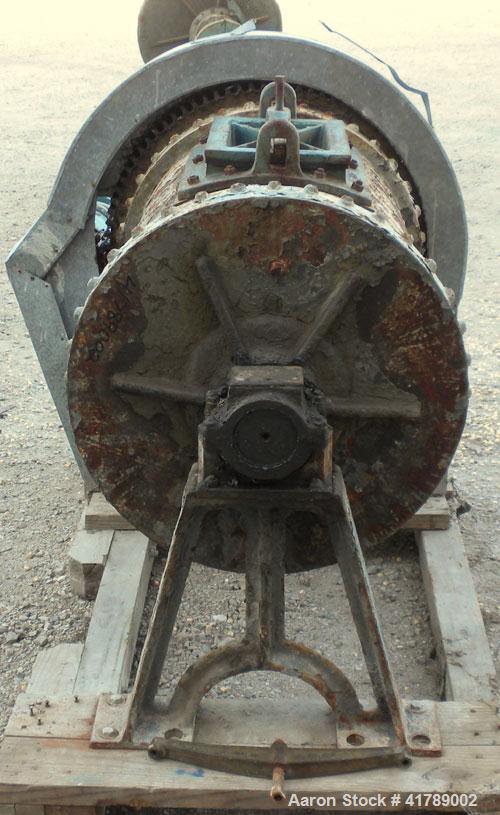 Used Ball Mill, Brick Lined/Carbon Steel. Approximately 21" diameter x 32" straight side. Approximate 6.4 cubic foot capacity (47.95 gallon). 12 1/2" x 8 1/2" charge/ discharge with cover. Driven by ...
