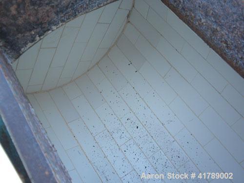 Used Ball Mill, Brick Lined/Carbon Steel. Approximately 21" diameter x 32" straight side. Approximate 6.4 cubic foot capacity (47.95 gallon). 12 1/2" x 8 1/2" charge/ discharge with cover. Driven by ...