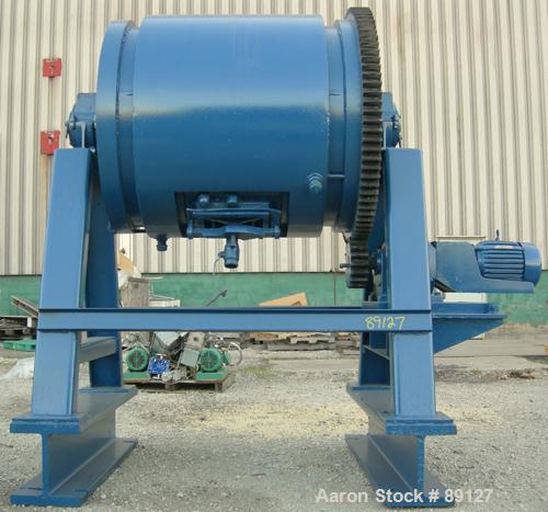 USED: Patterson Industries ball mill, carbon steel. Jacketed chamber, approximately 42" diameter x 48" long. 8-1/2" x 12-1/2" charge port with cover. Driven by a 10 hp, 3/60/200 volt, 1735 rpm XP mot...