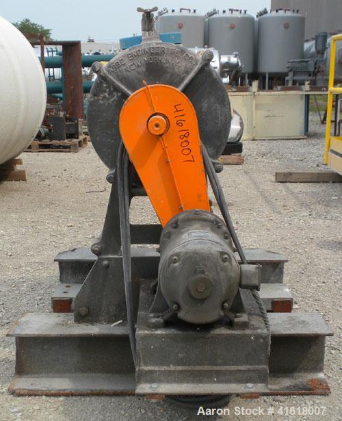 Used Abbe Engineering Ball Mill, porcelain lined chamber. 18" diameter x 16" long. Approximate 18 gallon (2 cubic foot) capacity. 6-1/2" charge/discharge port with clamp down cover. Driven by a 1/2 h...