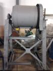 Used Ball Mill, 24 cubic foot capacity, rubber lined drum.  Includes complete mill motor, drive unit, control panels, electrical connection boxes.