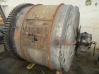 Used Patterson Ball Mill. 6 diameter x 5 wide steel lined ball mill with cooling jacket and dry grinding discharge shroud. Complete with motor, operational controls with timer, stands and discharge c...