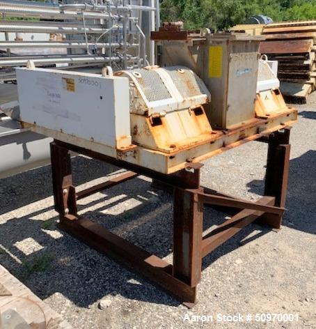 Used Stedman Cage Mill, Model A-18H9, Stainless steel.  Hammer Mill