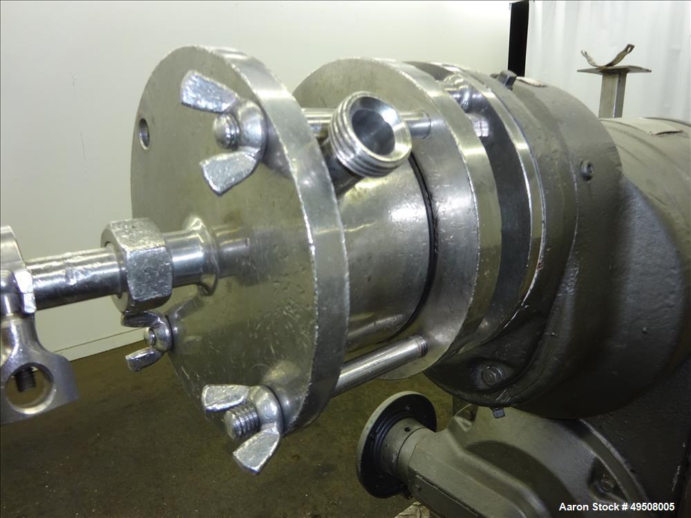 Used Colloid Mill, 316 Stainless Steel. Approximate 5-1/2" diameter chamber. Dual (40) pin rotor. Driven by a Reeves manual variable speed gearbox, 5 HP, 3/60/208-230/460 volt, 1725 rpm motor with 1....