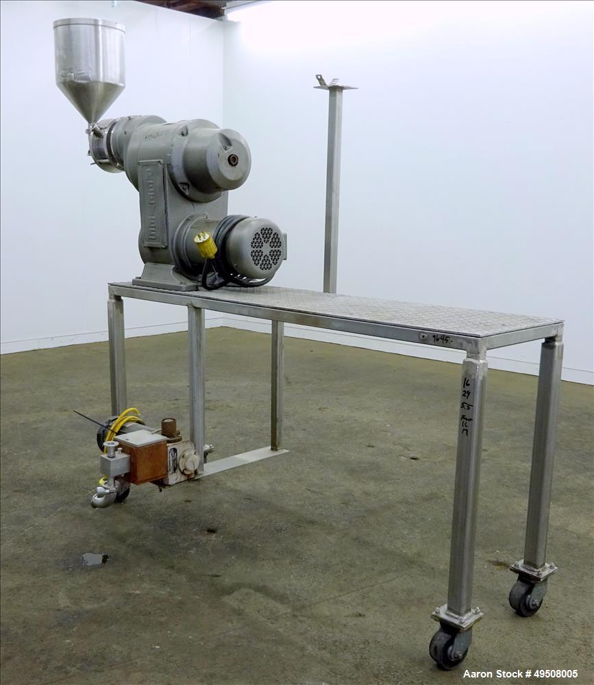 Used Colloid Mill, 316 Stainless Steel. Approximate 5-1/2" diameter chamber. Dual (40) pin rotor. Driven by a Reeves manual variable speed gearbox, 5 HP, 3/60/208-230/460 volt, 1725 rpm motor with 1....