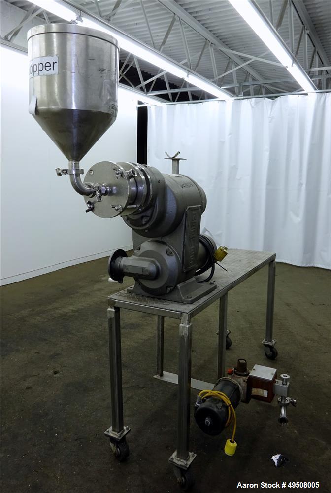 Used- Colloid Mill, 316 Stainless Steel. Approximate 5-1/2" diameter chamber. Dual (40) pin rotor. Driven by a Reeves manual...