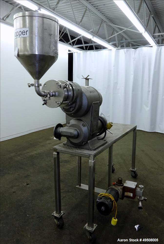 Used Colloid Mill, 316 Stainless Steel. Approximate 5-1/2" diameter chamber. Dual (40) pin rotor. Driven by a Reeves manual variable speed gearbox, 5 HP, 3/60/208-230/460 volt, 1725 rpm motor with 1....