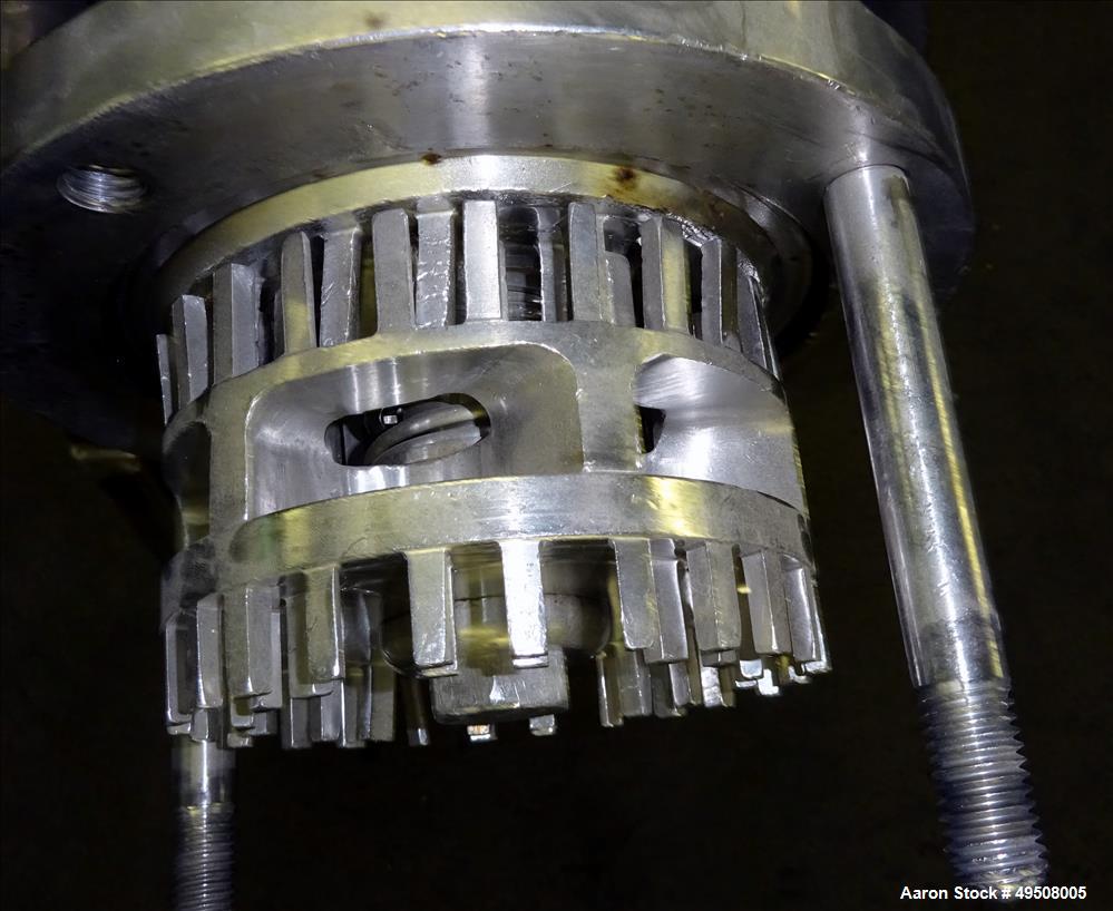Used Colloid Mill, 316 Stainless Steel. Approximate 5-1/2" diameter chamber. Dual (40) pin rotor. Driven by a Reeves manual variable speed gearbox, 5 HP, 3/60/208-230/460 volt, 1725 rpm motor with 1....