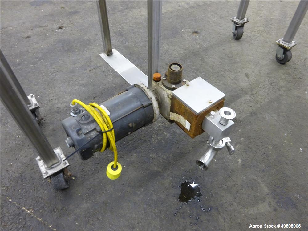 Used Colloid Mill, 316 Stainless Steel. Approximate 5-1/2" diameter chamber. Dual (40) pin rotor. Driven by a Reeves manual variable speed gearbox, 5 HP, 3/60/208-230/460 volt, 1725 rpm motor with 1....