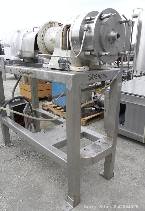 Used Charlotte Colloid Mill, Model SD 20, 316 stainless steel, sanitary design. Jacketed chamber approximately 7-1/2" diameter x 4" deep. Grooved stator, missing the rotor. 1-3/8" diameter inlet/outl...