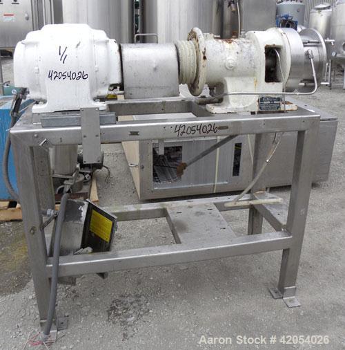 Used Charlotte Colloid Mill, Model SD 20, 316 stainless steel, sanitary design. Jacketed chamber approximately 7-1/2" diameter x 4" deep. Grooved stator, missing the rotor. 1-3/8" diameter inlet/outl...