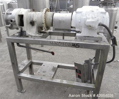 Used Charlotte Colloid Mill, Model SD 20, 316 stainless steel, sanitary design. Jacketed chamber approximately 7-1/2" diameter x 4" deep. Grooved stator, missing the rotor. 1-3/8" diameter inlet/outl...