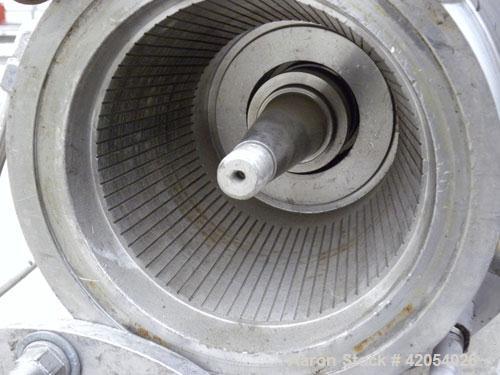 Used Charlotte Colloid Mill, Model SD 20, 316 stainless steel, sanitary design. Jacketed chamber approximately 7-1/2" diameter x 4" deep. Grooved stator, missing the rotor. 1-3/8" diameter inlet/outl...