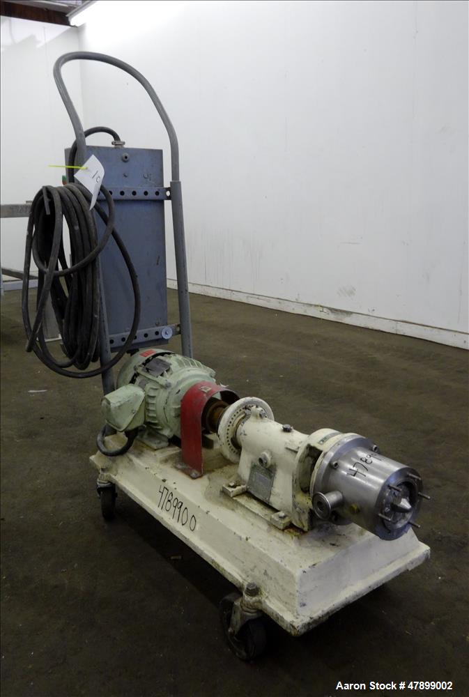Used Charlotte Colloid Mill, Model SD 2, 316 Stainless Steel, Sanitary Design. Jacketed chamber approximately 7-1/2" diameter x 4" deep. Grooved stator & rotor. Approximate 1" diameter inlet/outlet. ...