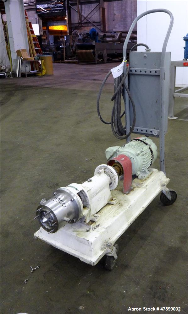 Used Charlotte Colloid Mill, Model SD 2, 316 Stainless Steel, Sanitary Design. Jacketed chamber approximately 7-1/2" diameter x 4" deep. Grooved stator & rotor. Approximate 1" diameter inlet/outlet. ...