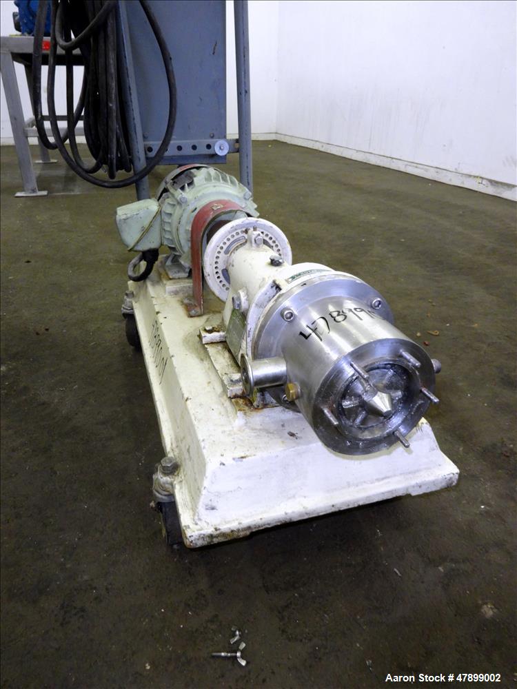 Used Charlotte Colloid Mill, Model SD 2, 316 Stainless Steel, Sanitary Design. Jacketed chamber approximately 7-1/2" diameter x 4" deep. Grooved stator & rotor. Approximate 1" diameter inlet/outlet. ...
