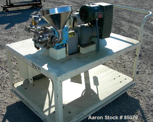 USED: Charlotte colloid mill, model SD2, 316 stainless steel, sanitary design. Jacketed chamber. Approx 2-3/4" diameter grooved rotor with stator. 7/8" diameter tri clamp inlet/outlet. Rated 1-60 gal...