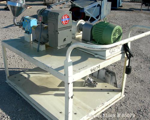 USED: Charlotte colloid mill, model SD2, 316 stainless steel, sanitary design. Jacketed chamber. Approx 2-3/4" diameter grooved rotor with stator. 7/8" diameter tri clamp inlet/outlet. Rated 1-60 gal...