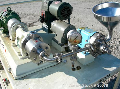 USED: Charlotte colloid mill, model SD2, 316 stainless steel, sanitary design. Jacketed chamber. Approx 2-3/4" diameter grooved rotor with stator. 7/8" diameter tri clamp inlet/outlet. Rated 1-60 gal...