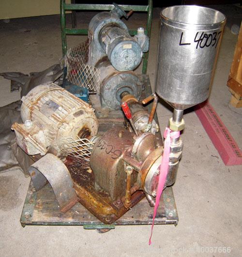 Used Gaulin Colloid Mill, Type 4D, stainless steel. Top feed hopper. 1 1/2" inlet, 1" outlet. Direct coupled to a 7 1/2 hp, 3/60/220/440 volt, 3500 rpm motor. Base mounted.