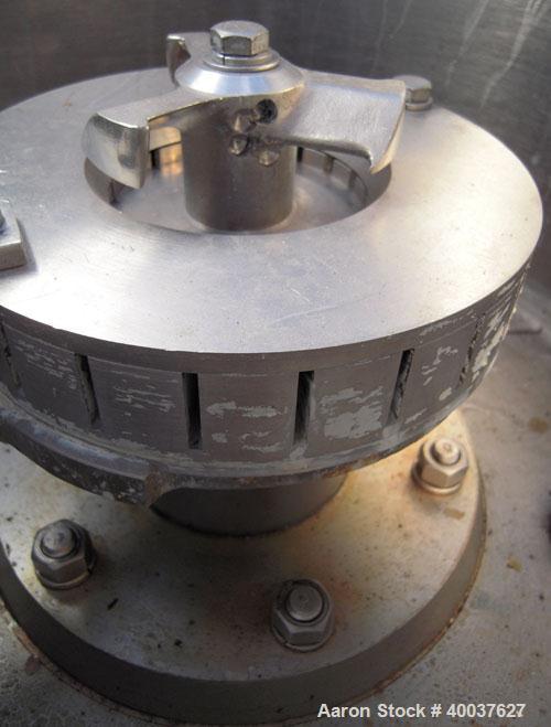 Used Kady mill, model OB, stainless steel. 7 to 20 gallon batch. 18" diameter x 24" deep jacketed bowl, approximately 7" diameter stainless steel rotor and stator. Off center bottom discharge. Driven...