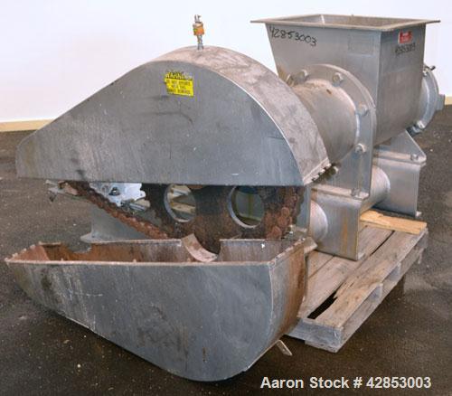 Used Rietz Bepex Extructor, Model RE-15-K7E328, 304 Stainless Steel. 14" Diameter blade. End orifice plate. 24’’ x 22’’ Top feed hopper. Driven by a 25 hp 3/60/230/460 volt, 1775 rpm gear motor, no r...