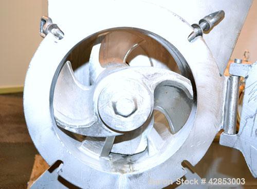 Used Rietz Bepex Extructor, Model RE-15-K7E328, 304 Stainless Steel. 14" Diameter blade. End orifice plate. 24’’ x 22’’ Top feed hopper. Driven by a 25 hp 3/60/230/460 volt, 1775 rpm gear motor, no r...