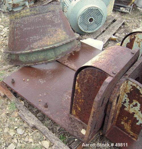 Used Rietz Vertical Disintegrator, Model RD18, Carbon Steel. Driven by a 150 hp 3/60/230/460 volt, 3530 rpm motor.  Includes a 24" diameter discharge hopper.
