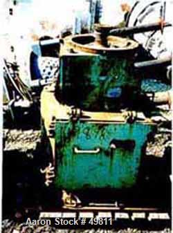 Used Rietz Vertical Disintegrator, Model RD18, Carbon Steel. Driven by a 150 hp 3/60/230/460 volt, 3530 rpm motor.  Includes a 24" diameter discharge hopper.