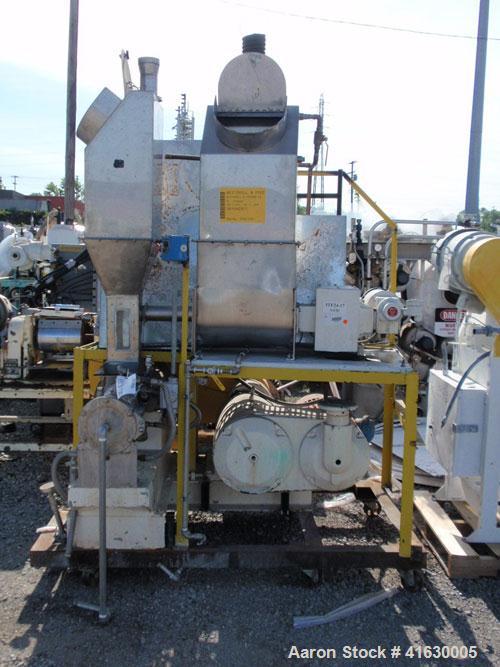 Used Rietz Extructor, Model RE6 K5F42, Stainless Steel. 6" diameter x 36" long screw, jacketed barrel, 5" x 6" feed section, driven by a 10 hp, 220/440 volt, Reeves variable speed motor. Includes an ...