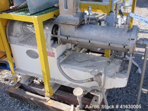 Used Rietz Extructor, Model RE6 K5F42, Stainless Steel. 6" diameter x 36" long screw, jacketed barrel, 5" x 6" feed section, driven by a 10 hp, 220/440 volt, Reeves variable speed motor. Includes an ...