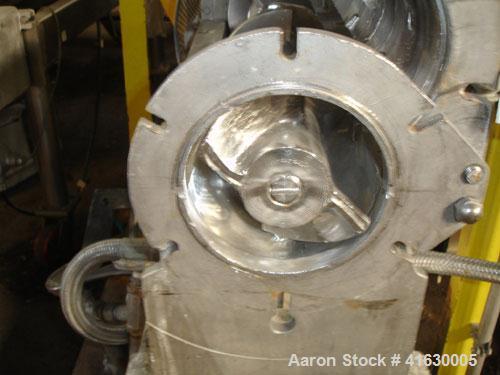 Used Rietz Extructor, Model RE6 K5F42, Stainless Steel. 6" diameter x 36" long screw, jacketed barrel, 5" x 6" feed section, driven by a 10 hp, 220/440 volt, Reeves variable speed motor. Includes an ...