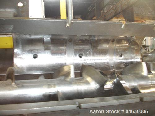 Used Rietz Extructor, Model RE6 K5F42, Stainless Steel. 6" diameter x 36" long screw, jacketed barrel, 5" x 6" feed section, driven by a 10 hp, 220/440 volt, Reeves variable speed motor. Includes an ...