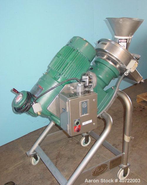 Used Rietz Disintegrator, model RP6K115, stainless steel. 5 1/2" infeed throat, 12" x 9" deep clamp down funnel style feed. (1) 2 blade knife edge blade, (3) sets 4 blade blunt edge knife. 13 1/2" x ...