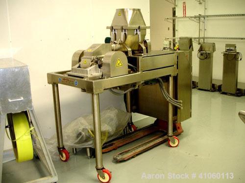 Used Fitzpatrick Fitzmill, Model DASO6, stainless steel construction, fixed blades, reversible chamber, screw feed with motors, seria l#11631.