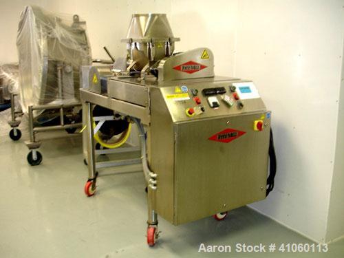 Used Fitzpatrick Fitzmill, Model DASO6, stainless steel construction, fixed blades, reversible chamber, screw feed with motors, seria l#11631.