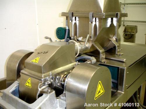 Used Fitzpatrick Fitzmill, Model DASO6, stainless steel construction, fixed blades, reversible chamber, screw feed with motors, seria l#11631.