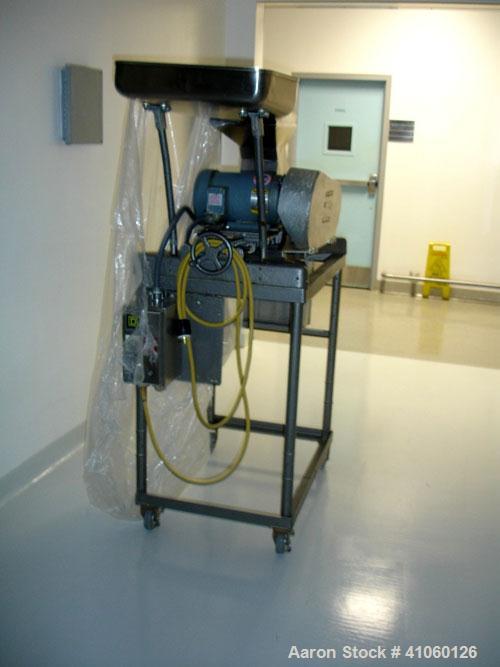 Used Fitzmill, Model D6, stainless steel construction, swinging hammers, reversible chamber, pan feed with 5 hp motor on stands.